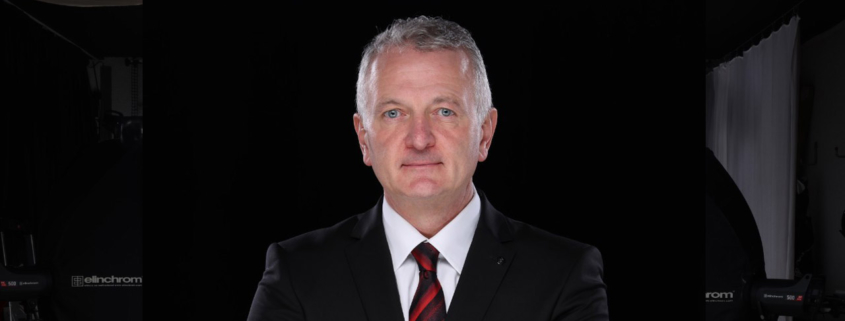 Professional Studio Portrait in black suit - panoramic