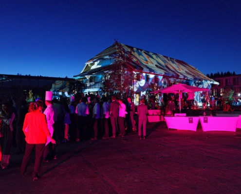 Inauguration of the new EHL campus at dusk with &quot;the farm&quot; in the foreground.